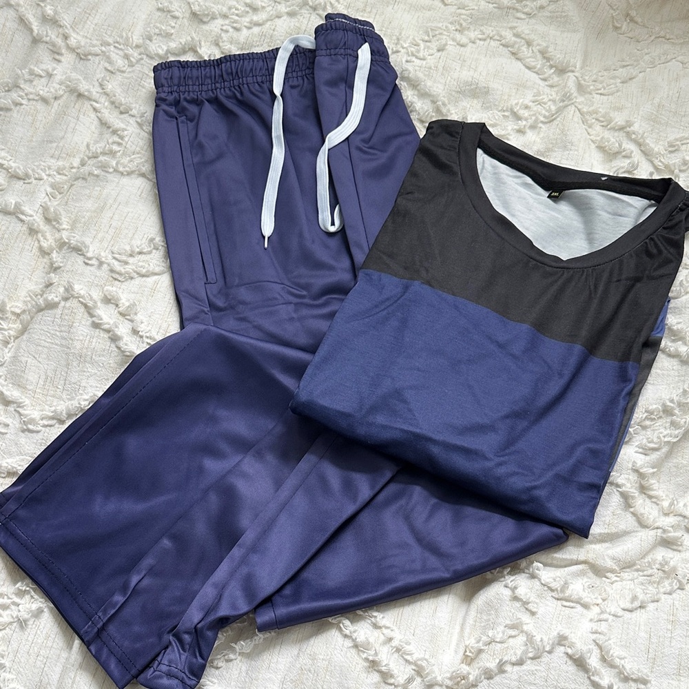 Men’s track suit set - Short sleeve color block shirt with long pants.